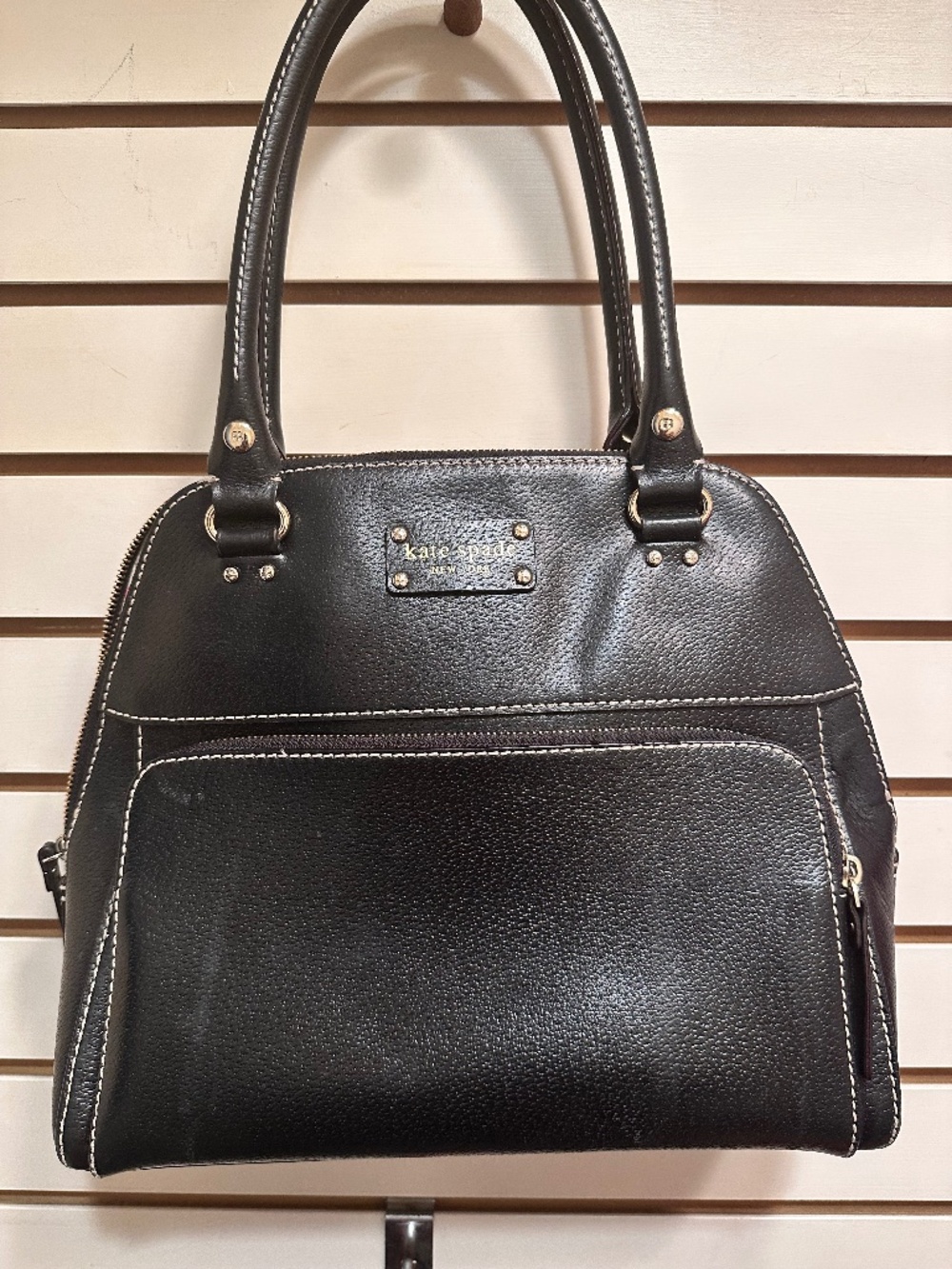 Kate Spade Baxter Street Catalina black leather satchel bag featuring prominent